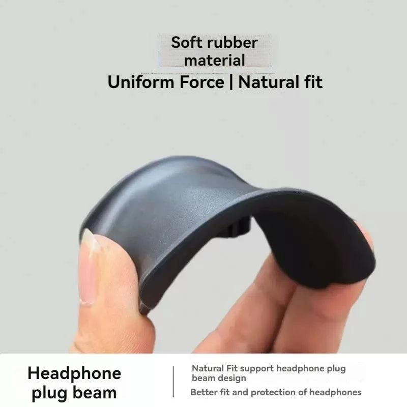 Headphone plug beam held by a hand with text about soft rubber material and uniform force.